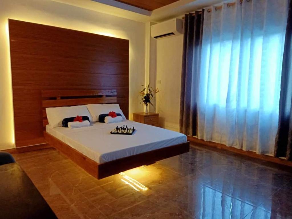 Postel nebo postele na pokoji v ubytování GBU Loboc River Guesthouse