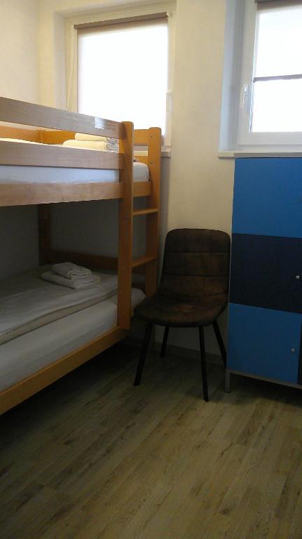 Postel nebo postele na pokoji v ubytování BORA Appartements Zell am See