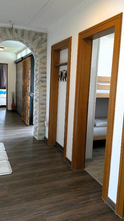 Postel nebo postele na pokoji v ubytování BORA Appartements Zell am See