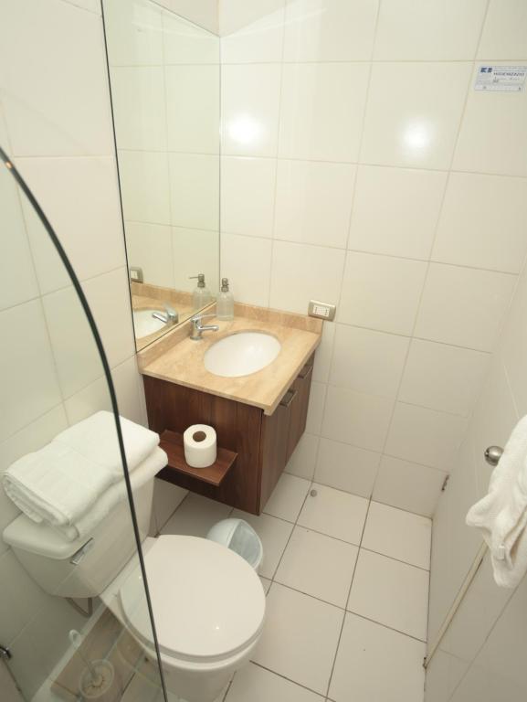 Koupelna v ubytování De Triana Hotel