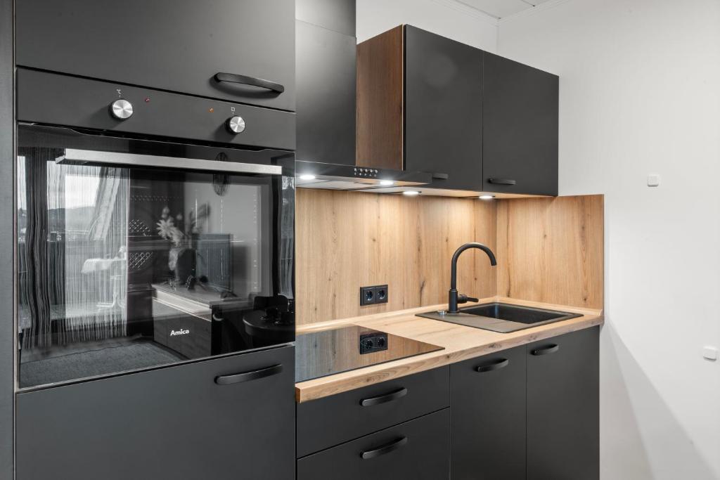 Kuchyň nebo kuchyňský kout v ubytování Ferienwohnung im Zemmer