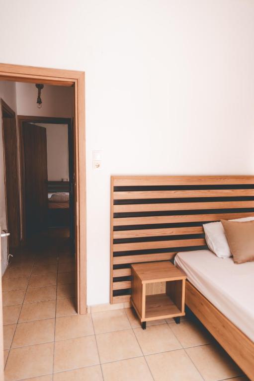 Łóżko lub łóżka w pokoju w obiekcie Μpasias Apartments