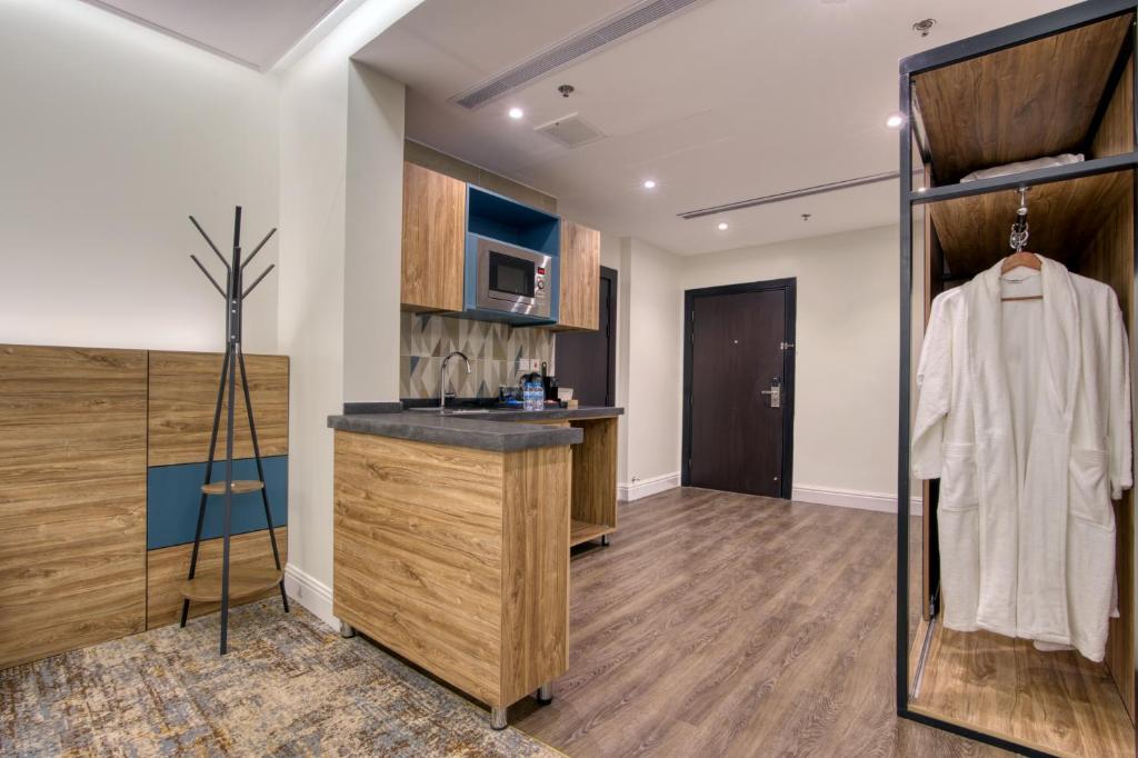 Kuchyň nebo kuchyňský kout v ubytování Aluya Hotel