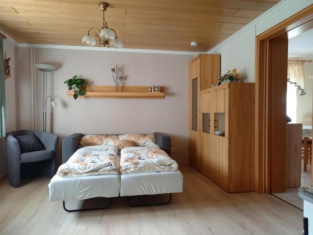 מיטה או מיטות בחדר ב-Nette Wohnung in Zescha mit Garten und Terrasse