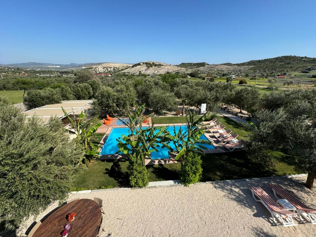 an aerial view of a resort with a swimming pool at Alaçatı Beka House in Alacati
