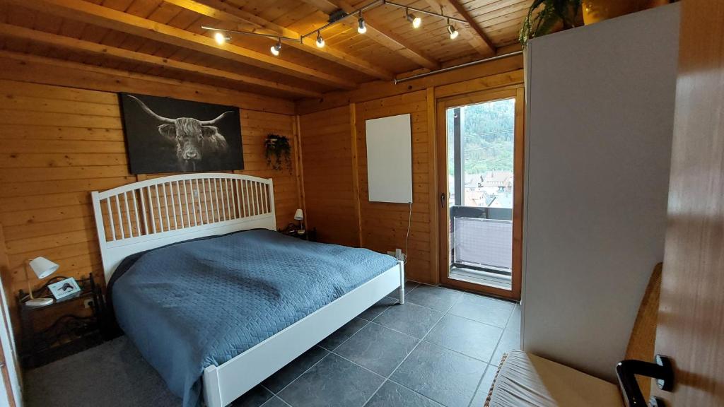 Postel nebo postele na pokoji v ubytování Ferienwohnungen Sonnenhalde mit schöner Aussicht