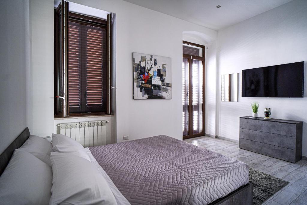 Alivi Indipendent Apartment tesisinde bir odada yatak veya yataklar