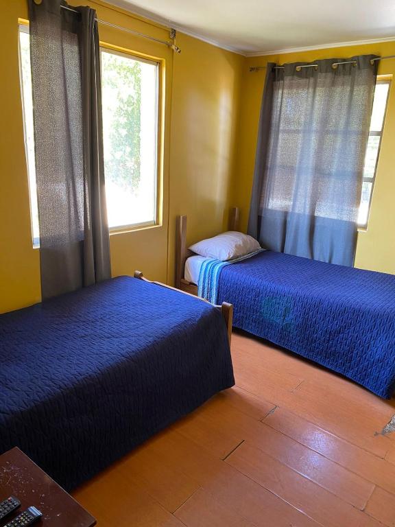 Letto o letti in una camera di Hostal Radal Molina
