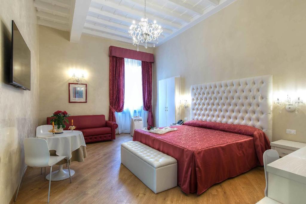 Posteľ alebo postele v izbe v ubytovaní Trevi Rome Suite