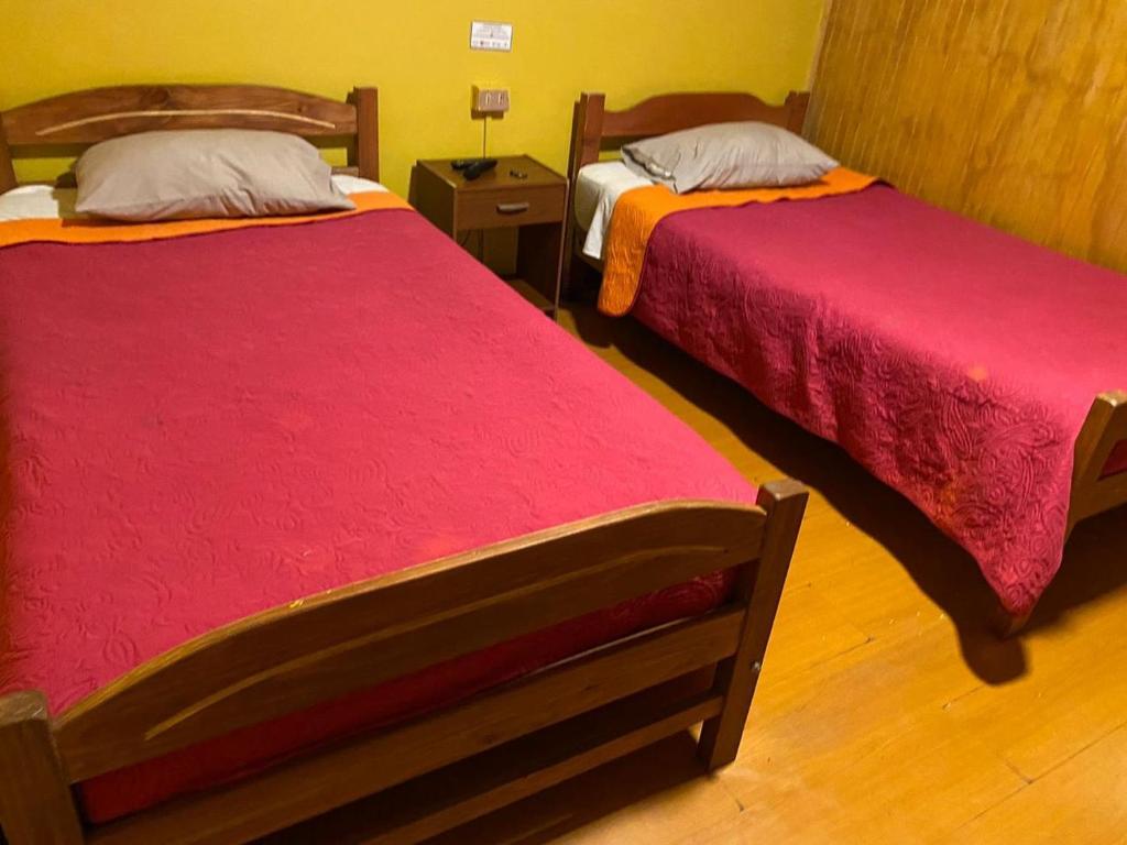 Letto o letti in una camera di Hostal Radal Molina