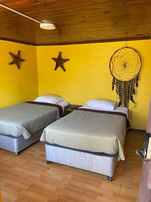 Letto o letti in una camera di Hostal Radal Molina