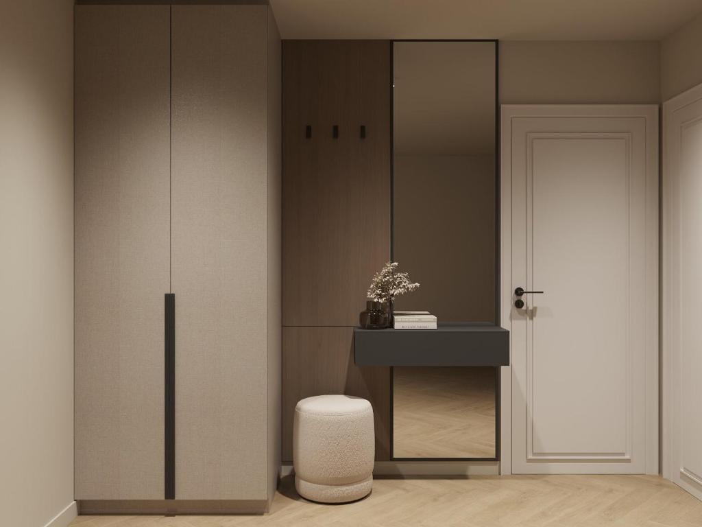 a room with a closet with a stool and a mirror at Luxury Apartments Stefano - Premium in Ohrid