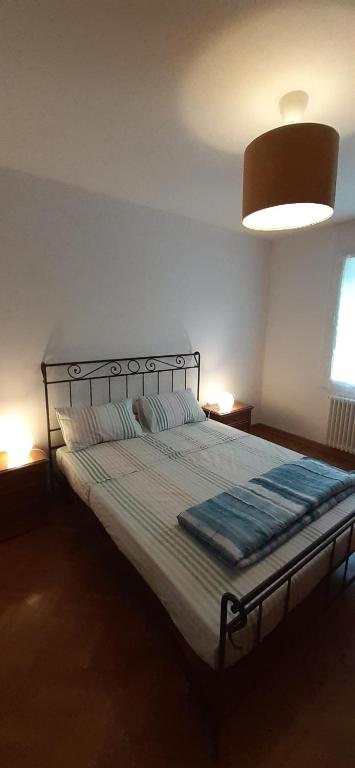 Postel nebo postele na pokoji v ubytování Duino Holiday