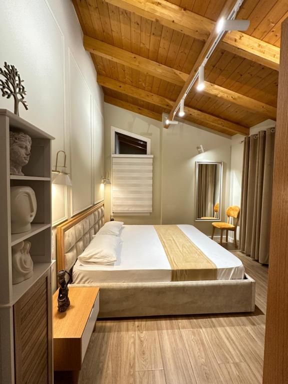 Postel nebo postele na pokoji v ubytování Arial Penthouse Suites