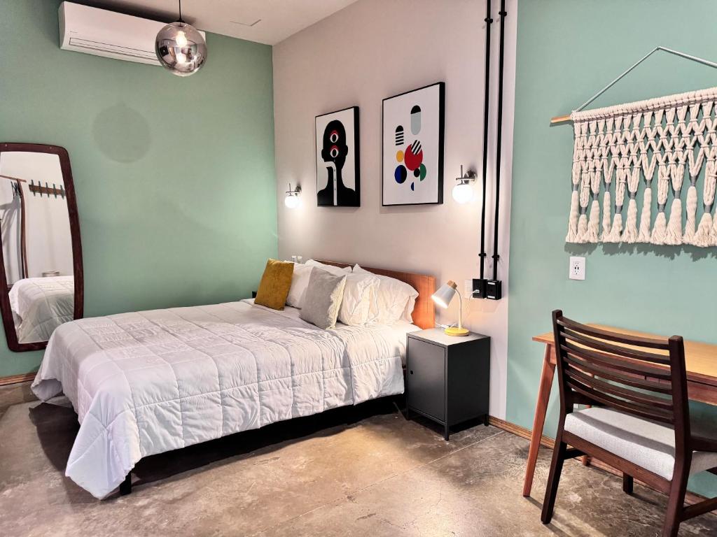 Postel nebo postele na pokoji v ubytování Hotel Olá Chapultepec