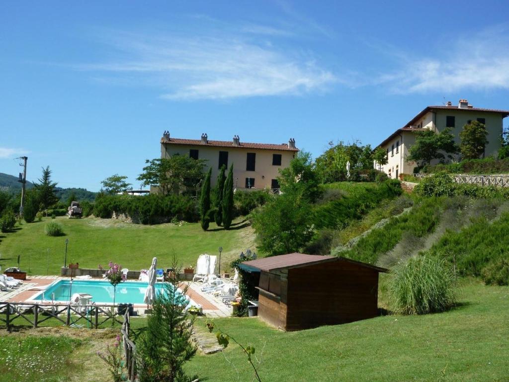 Vista de la piscina de Ferienwohnung für 4 Personen 3 Kinder ca 70 qm in Dicomano, Toskana Provinz Florenz - b62903 o d'una piscina que hi ha a prop