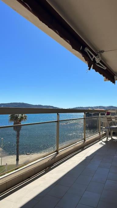 a view of the ocean from the balcony of a house at Appartement panoramique sur mer in Toulon