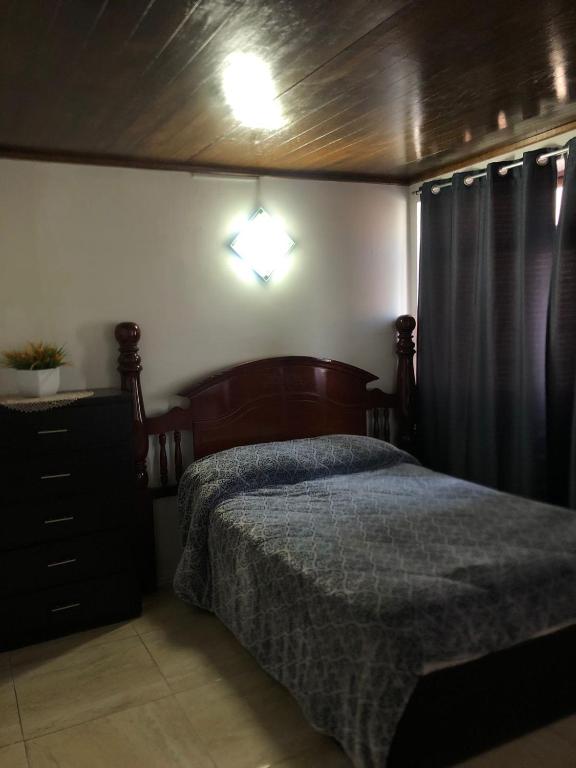 Postel nebo postele na pokoji v ubytování El Hogar de Carmelita