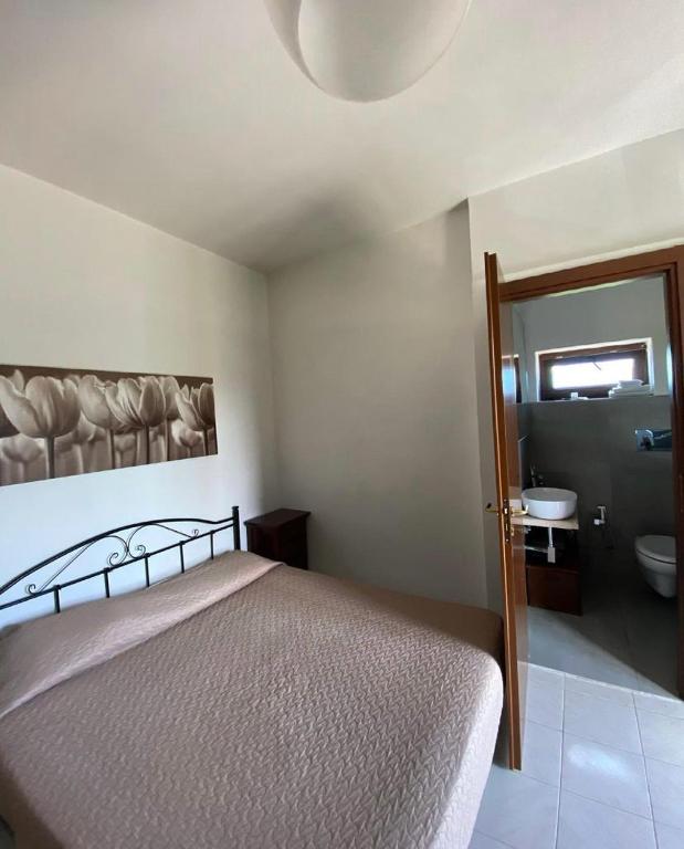 Letto o letti in una camera di GuesthouseAntonia