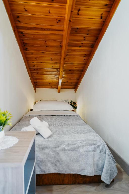 Postel nebo postele na pokoji v ubytování Bujtina ANLU