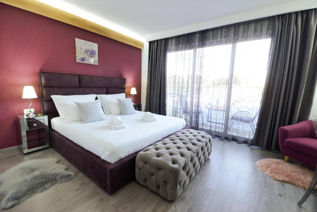 Posteľ alebo postele v izbe v ubytovaní PIAZZA ROOMS Zadar