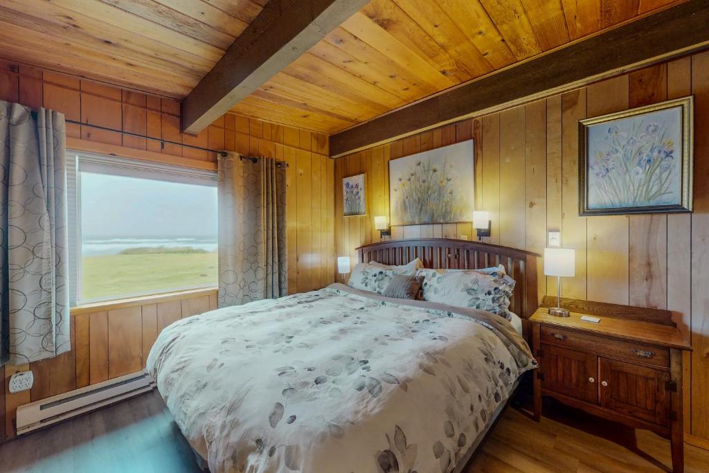 Postel nebo postele na pokoji v ubytování Sands End