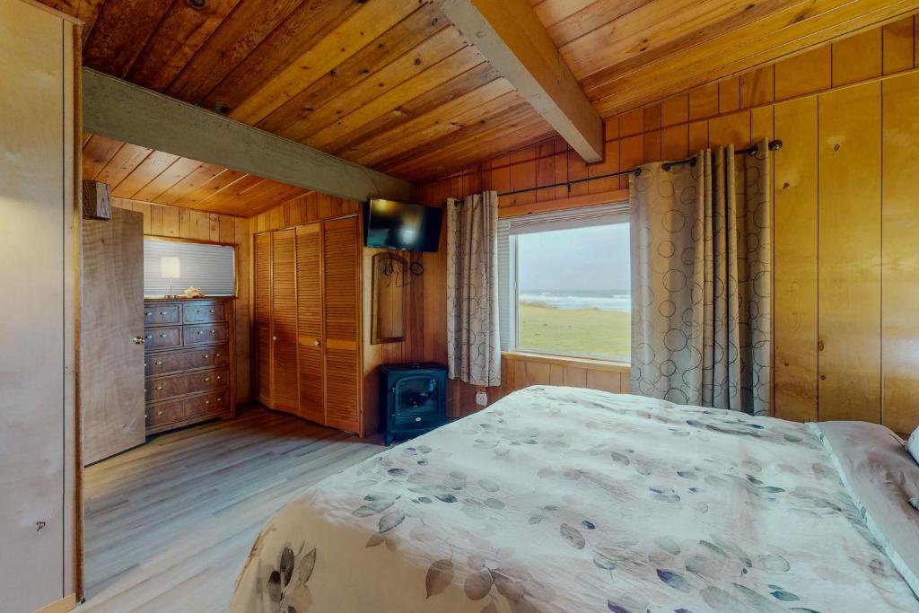 Postel nebo postele na pokoji v ubytování Sands End