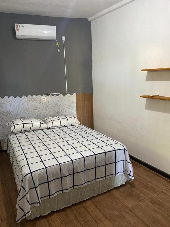 Postel nebo postele na pokoji v ubytování Pousada Alves e Almeida