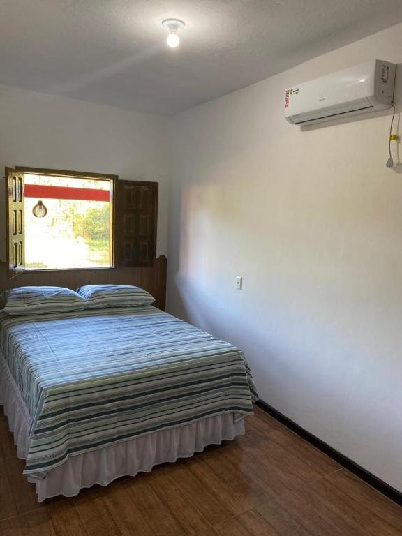 Postel nebo postele na pokoji v ubytování Pousada Alves e Almeida
