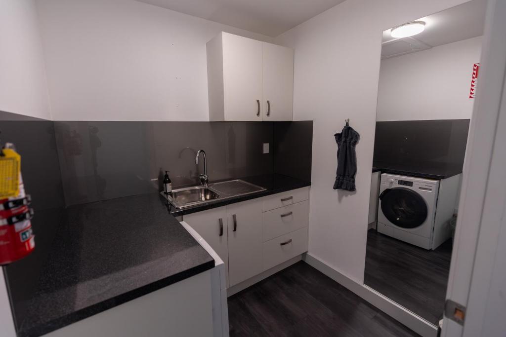 Kuchyň nebo kuchyňský kout v ubytování Riverstone House