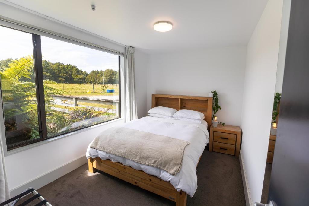 Postel nebo postele na pokoji v ubytování Riverstone House