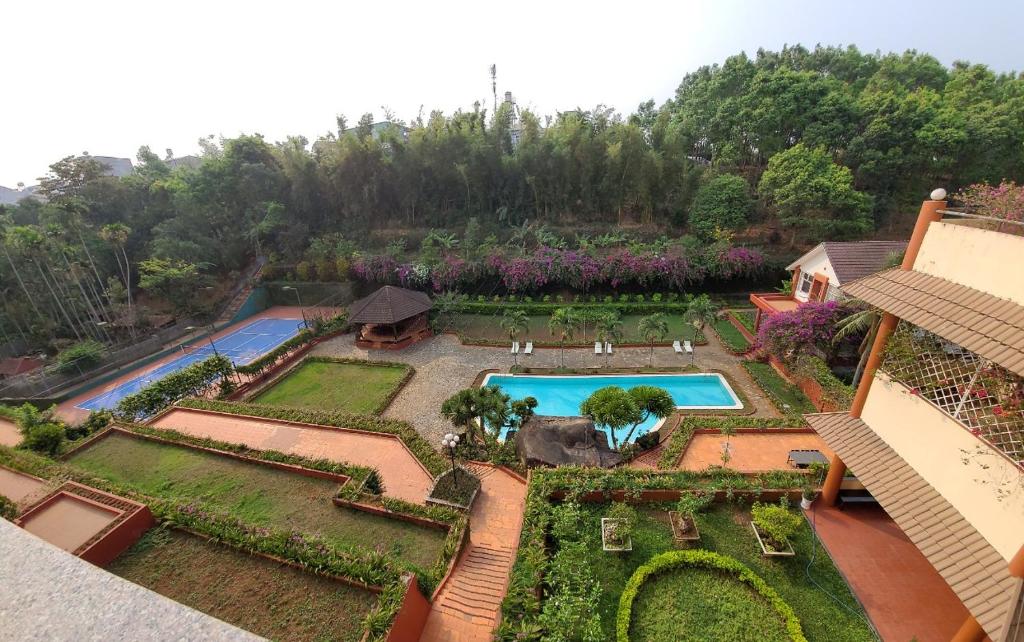 an aerial view of a resort with a swimming pool at Dam San Hotel in Buon Ma Thuot