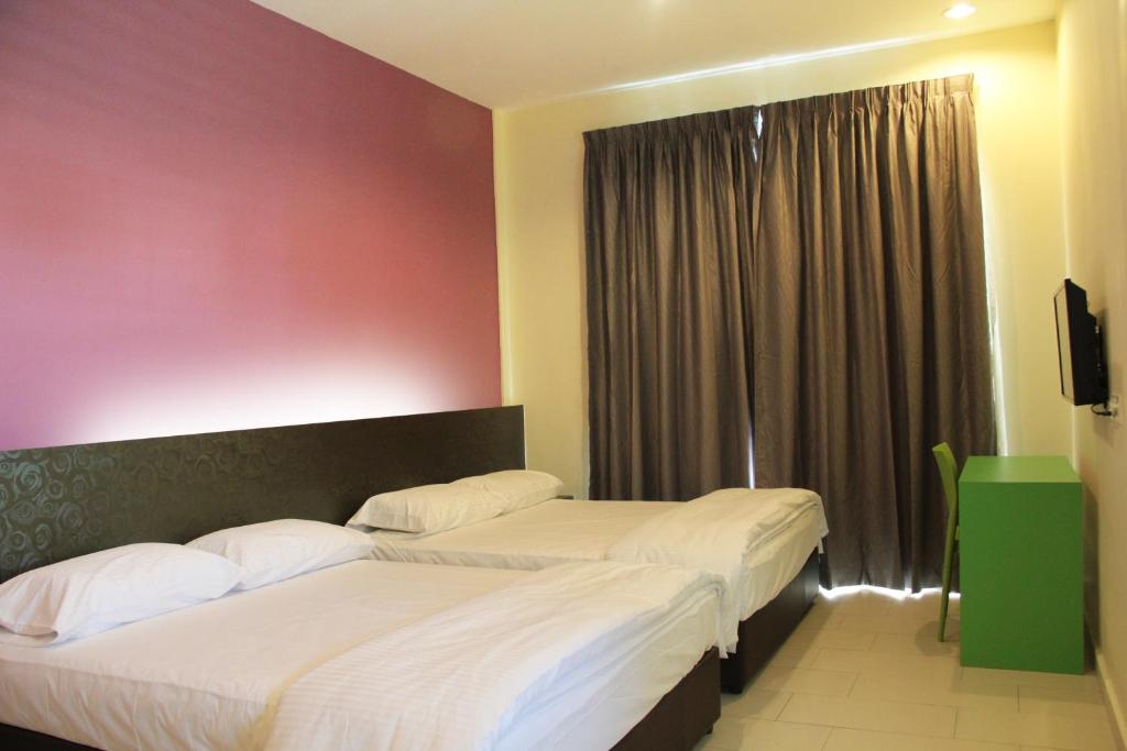 Postel nebo postele na pokoji v ubytování Hotel Mirage PD