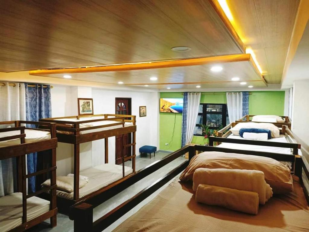 Postel nebo postele na pokoji v ubytování GBU Loboc River Guesthouse