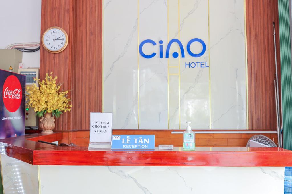 a lobby with a cico hotel sign on the wall at Khách sạn Ciao Quy Nhơn in Quy Nhon