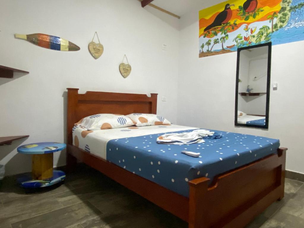 Postel nebo postele na pokoji v ubytování Acuarios Hostal