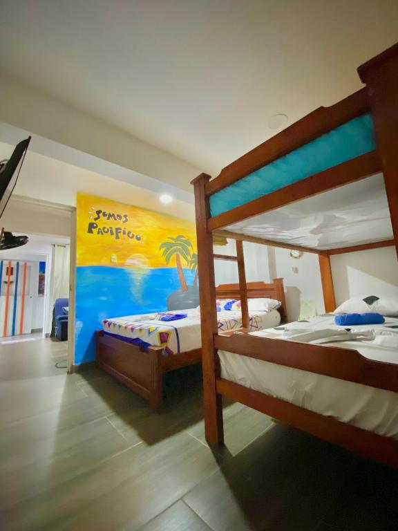 Postel nebo postele na pokoji v ubytování Acuarios Hostal