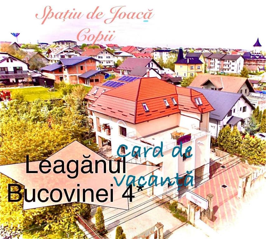 ariale Aussicht auf eine kleine Stadt mit Häusern in der Unterkunft Leaganul Bucovinei Guest House in Suceava
