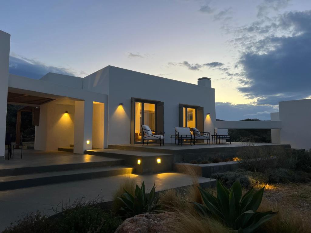 a villa with a view of the sunset at Villa Serene Milos in Empourios