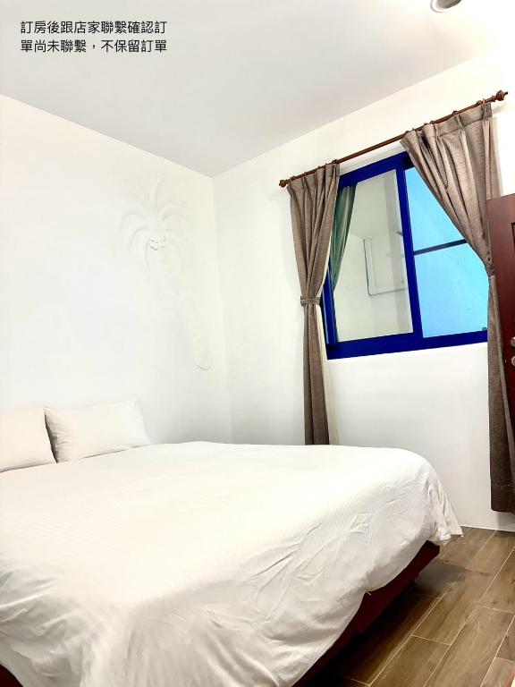 Postel nebo postele na pokoji v ubytování Nanwan254 Homestay
