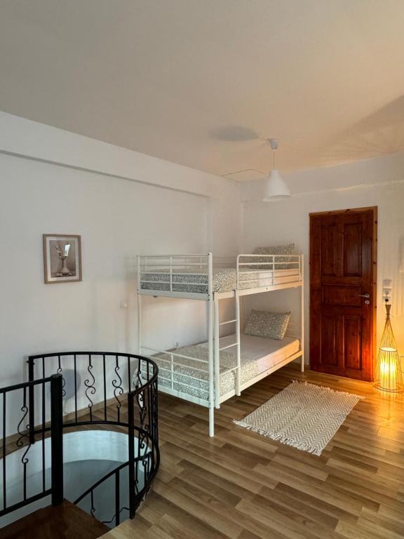Postel nebo postele na pokoji v ubytování Maro's house