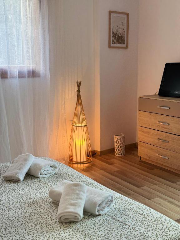 Postel nebo postele na pokoji v ubytování Maro's house