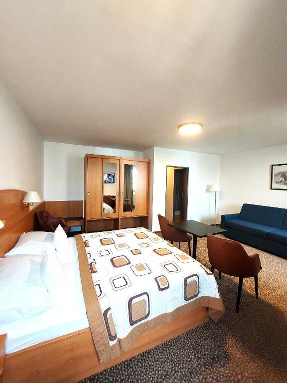 Postel nebo postele na pokoji v ubytování Hotel Avion