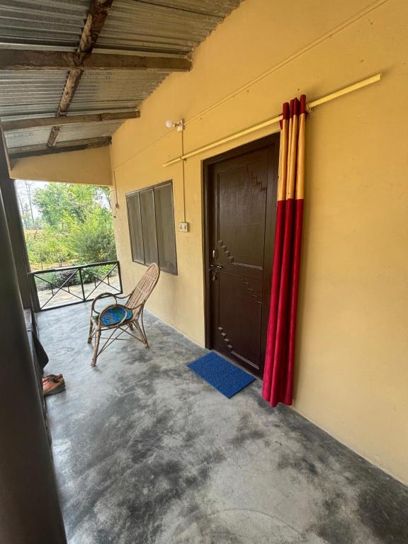 Balkón nebo terasa v ubytování Nanu's Bardiya Homestay