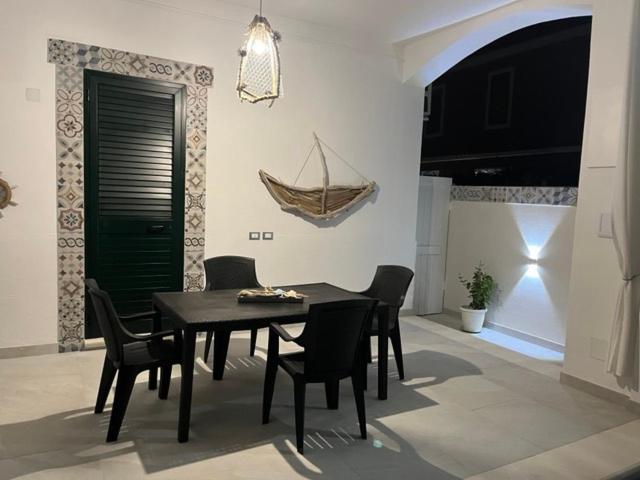 TV a/nebo společenská místnost v ubytování Holiday Rooms Ninfa