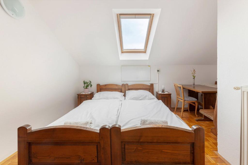 Postel nebo postele na pokoji v ubytování Bed and Breakfast Mili Vrh