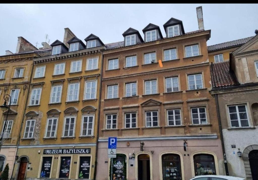 a large building with many windows on a street at La Mia Casa STARE MIASTO Warszawa in Warsaw