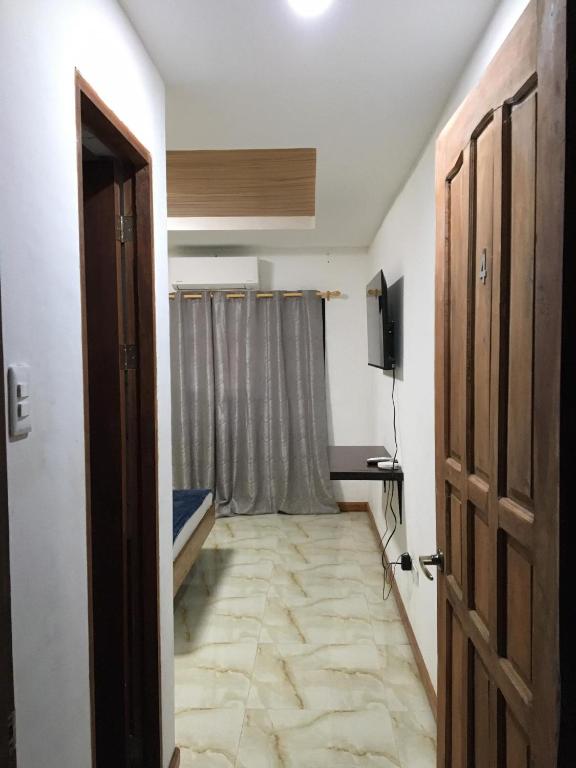 Postel nebo postele na pokoji v ubytování GBU Loboc River Guesthouse