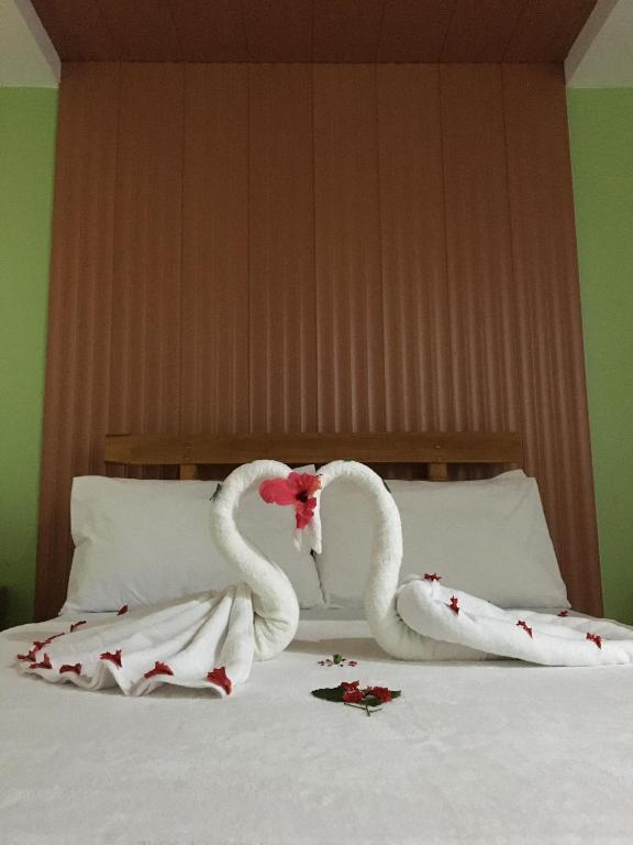 Postel nebo postele na pokoji v ubytování GBU Loboc River Guesthouse