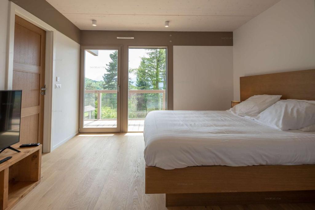 Posteľ alebo postele v izbe v ubytovaní Appartement UBAC